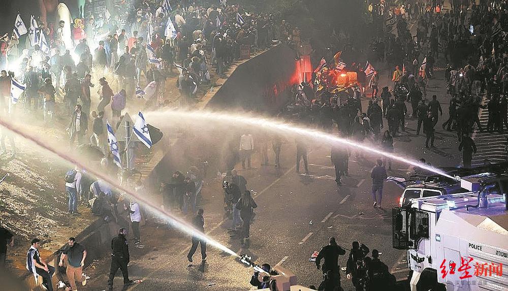 以色列爆发大规模抗议，以总理宣布推迟司法改革！总理之子：美国是幕后黑手